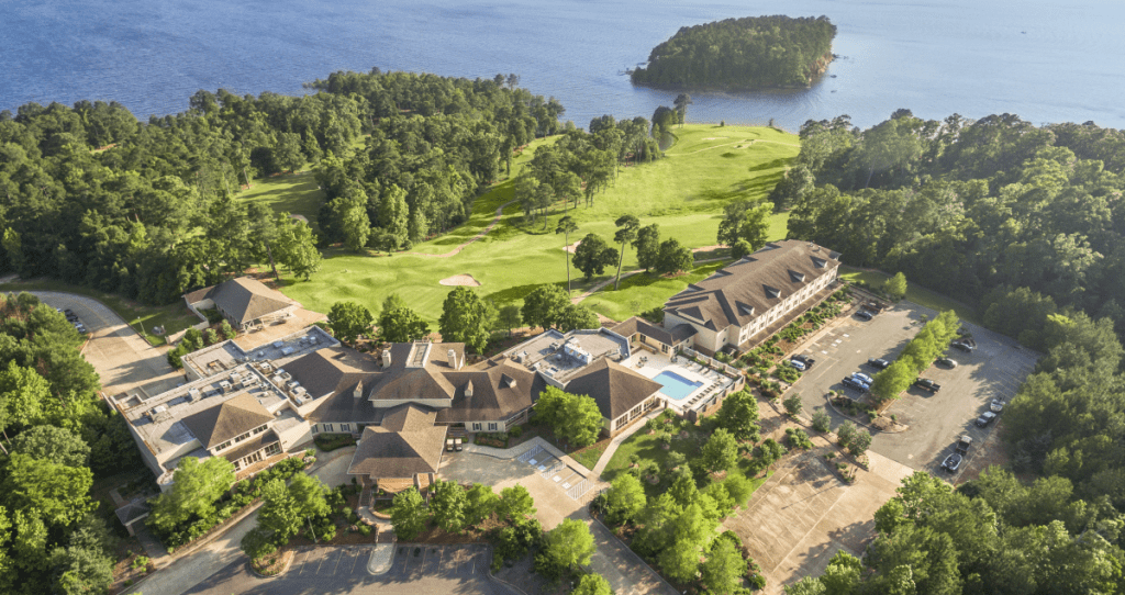 aerial view of golf course and resort